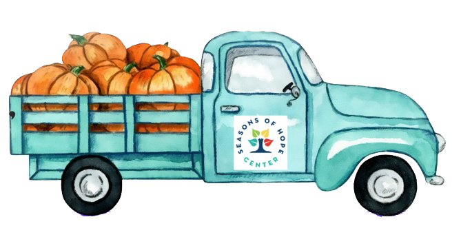 cartoon style truck with pumpkins in the bed.
